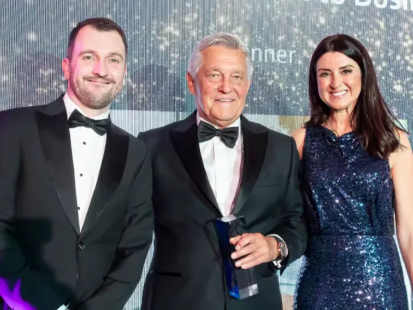 MKM with award trophy