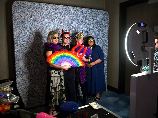 prop photobooth with people posing